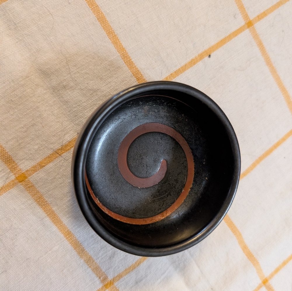 Black Ceramic Bowl with Brown Spiral Design